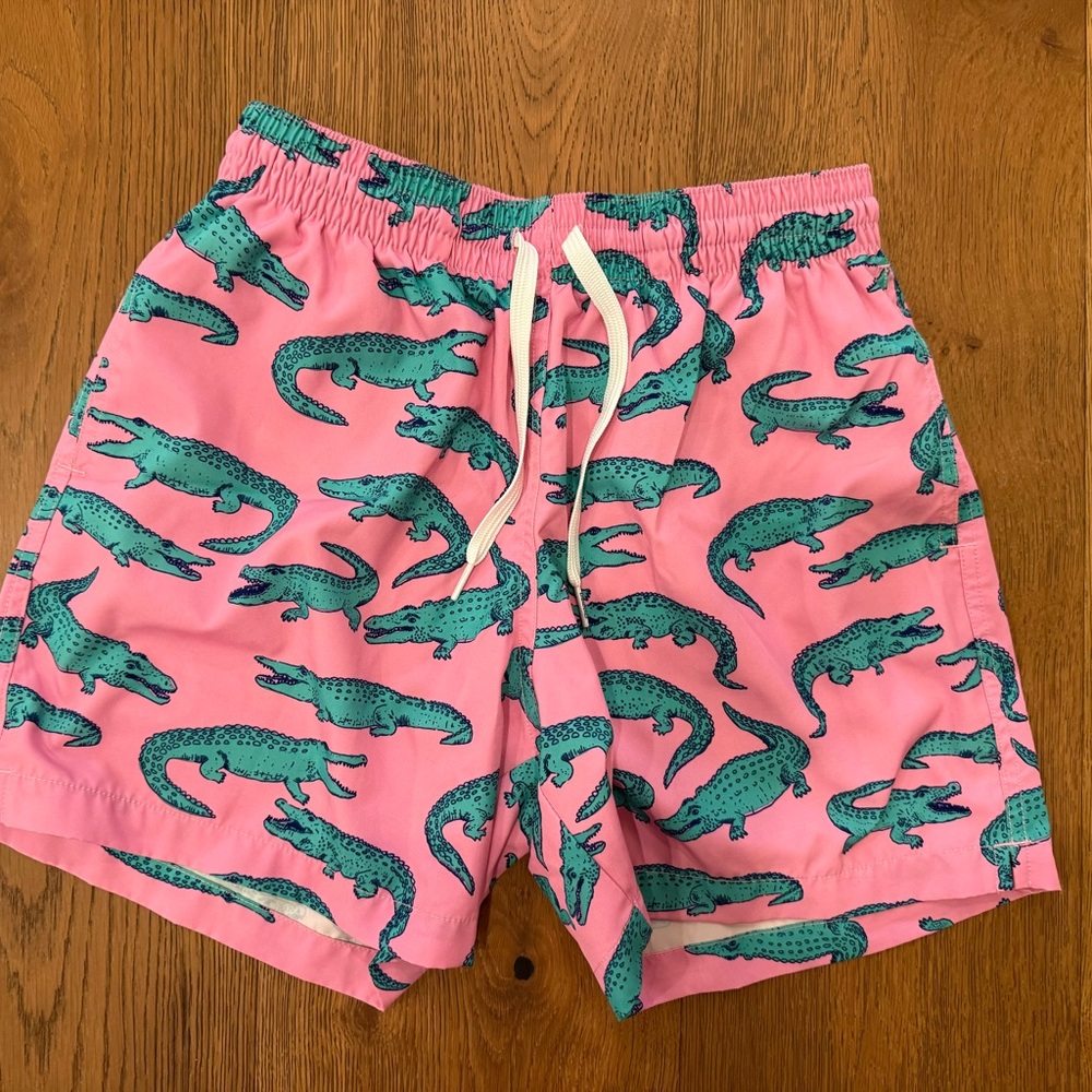 Chubbies Pink Swim Shorts with Green Alligator Design